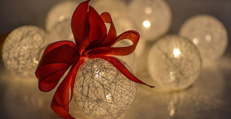 Glass bauble lights with red ribbon