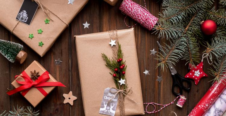 Photo of Christmas presents, ribbons and wreaths