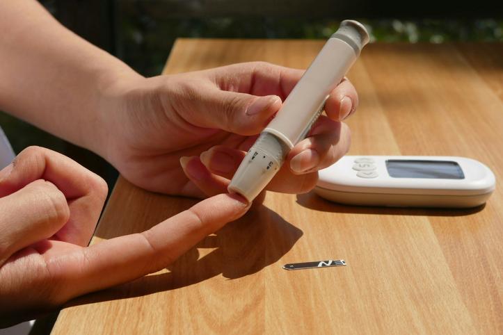 Person checking blood sugar levels for diabetes